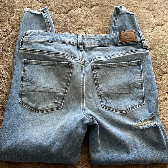 American Eagle Jeggings. Light blue in color with holes down both legs. - Picture 6 of 6
